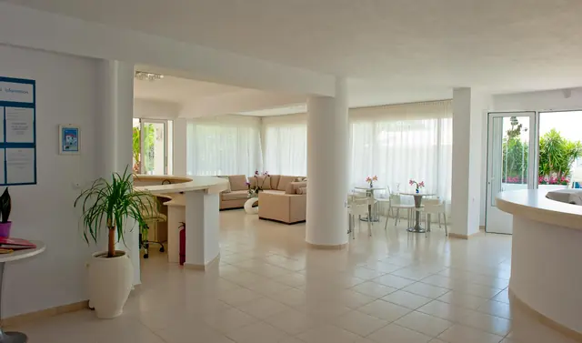 The bright ground floor: reception, lounge and café